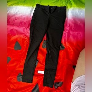 Skinny black slacks